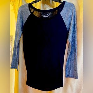 Size Medium Polyester. Nylon. Metallic Sleeves